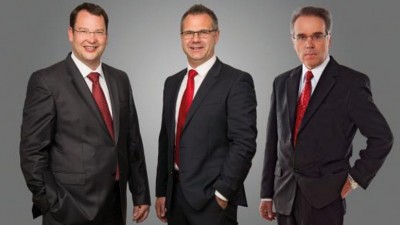 Dirk Amann, Martin Haaf und Ludwig Fleckenstein freuen sich über das Jubiläum (v. l.) Foto: i.safe Mobile